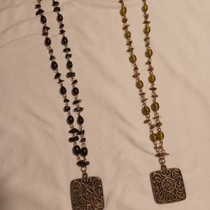 2 necklaces, same style, different colors. 1 black, 1 green $7 each